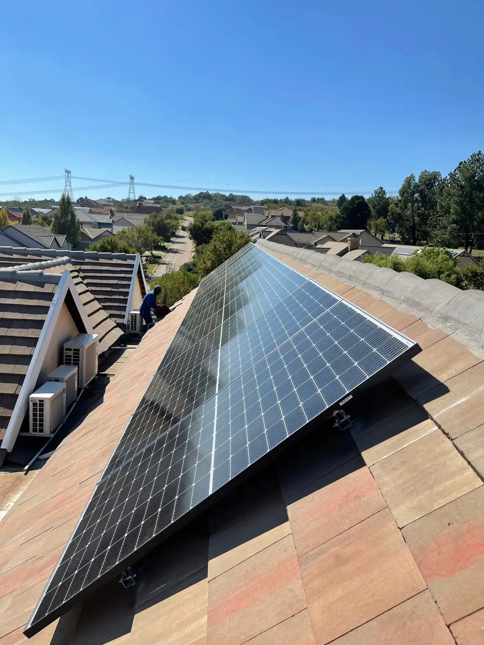 Panels running down a tiled roof