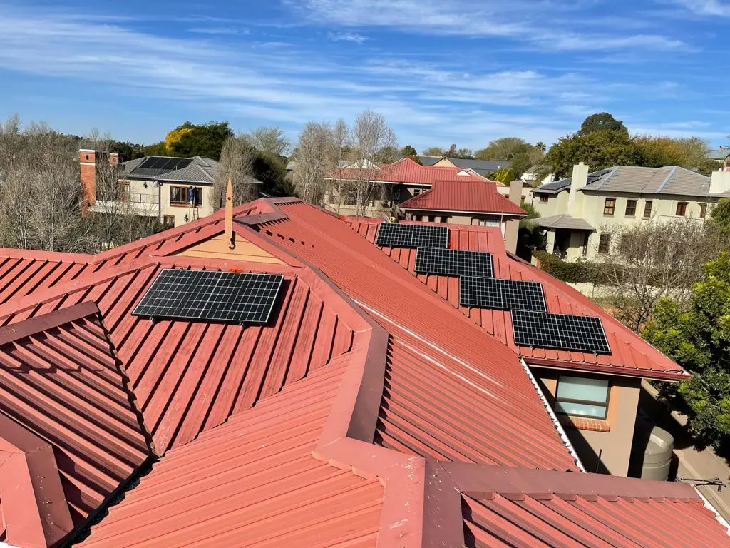 Panels on a red tiled roof